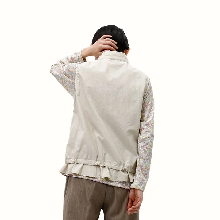 【裾のフリルが大人カワイイを演出・洗濯機◎たたんでバッグにIN】ナイロンタフタベスト